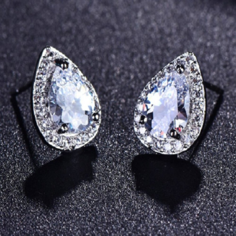 White Sapphire Pear Cut Stud Earrings